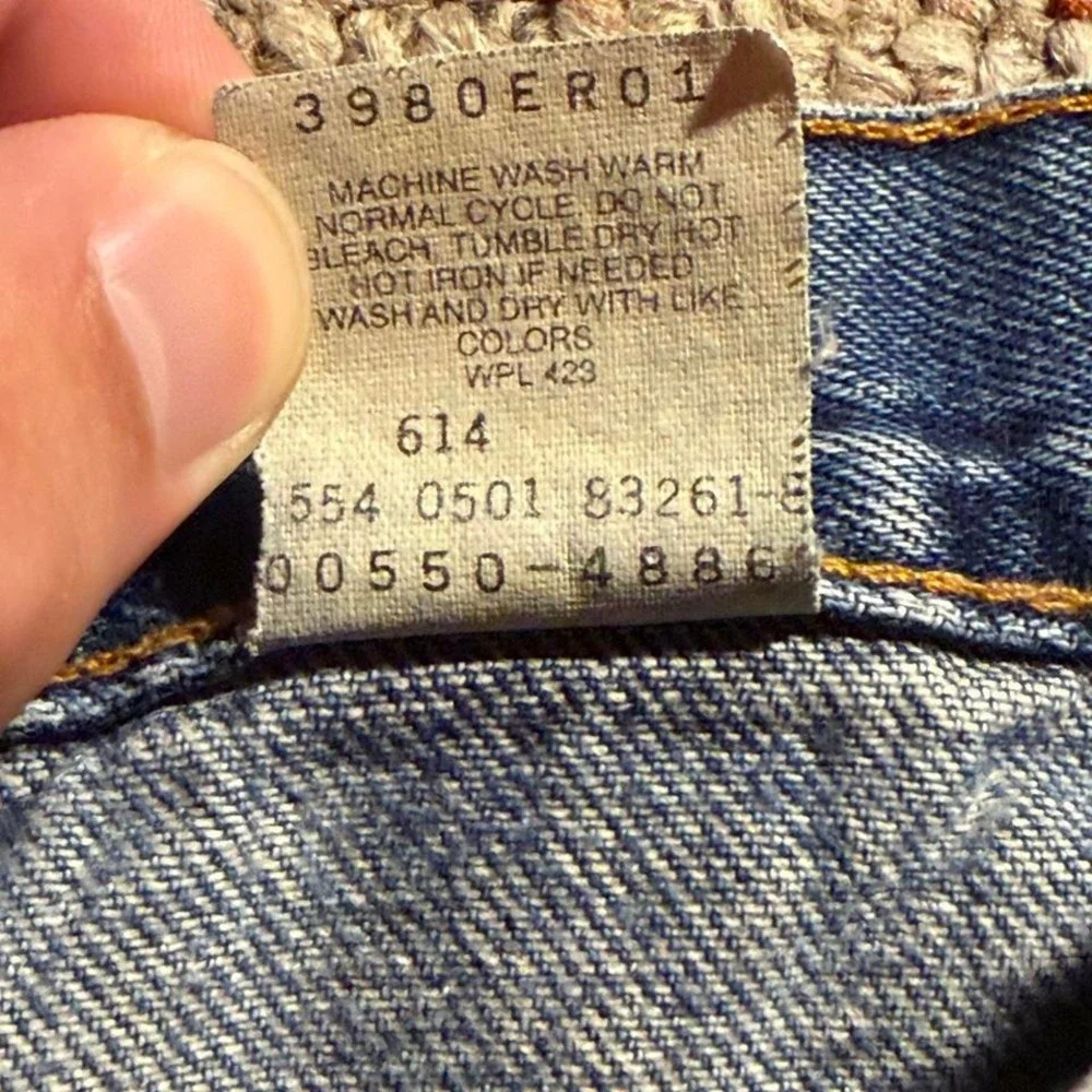 Vintage Made in USA Levi's 550 Relaxed Fit Jeans Distressed Light Wash 33x32